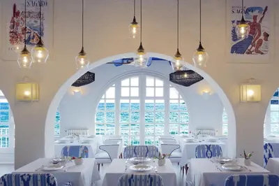 Un restaurante o sitio para comer en Hostal de la Gavina GL - The Leading Hotels of the World