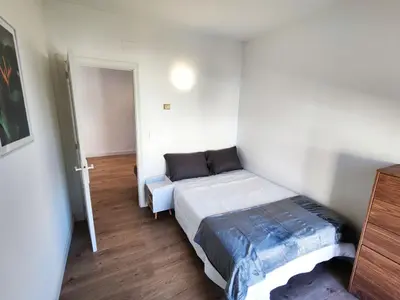 Cama o camas de una habitación en Apartamento a 100m de la playa