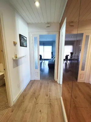 Una televisión o centro de entretenimiento en Apartamento a 100m de la playa