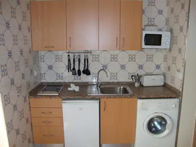 Una cocina o zona de cocina en Apartaments Claudi