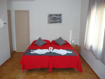 Cama o camas de una habitación en Apartaments Claudi