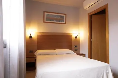Cama o camas de una habitación en Hotel Sant Celoni