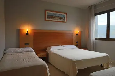 Cama o camas de una habitación en Hotel Sant Celoni