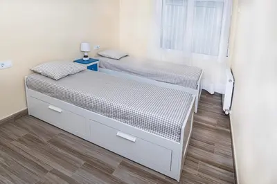 Cama o camas de una habitación en Apartmento con piscina y pista de tennis