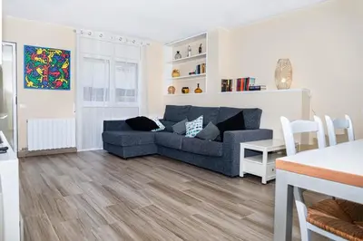 Zona de estar de Apartmento con piscina y pista de tennis