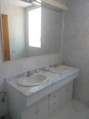 Un baño de Family villa with sea view and pool