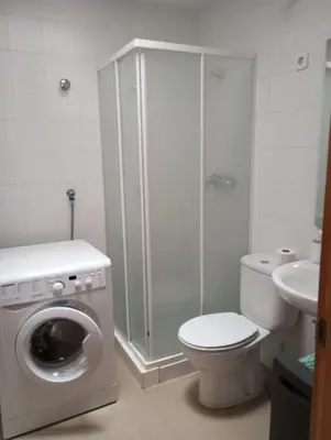 Un baño de Family villa with sea view and pool