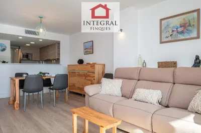 Zona de estar de El Coralí Apartament Palamós