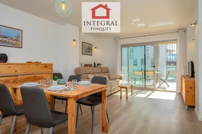 Una televisión o centro de entretenimiento en El Coralí Apartament Palamós