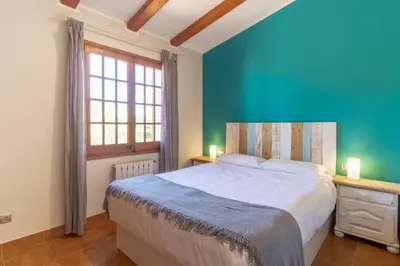 Cama o camas de una habitación en Ca la Goyi