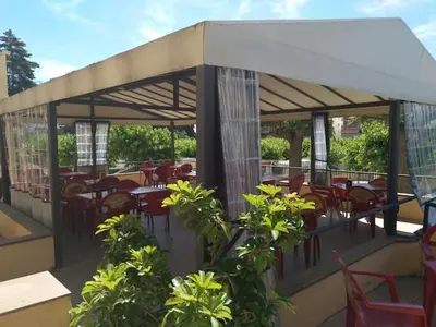 Un restaurante o sitio para comer en Camping Victoria