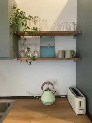 Una cocina o zona de cocina en Stylish 3 Bedroom Apartment