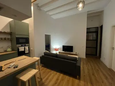 Una televisión o centro de entretenimiento en Stylish 3 Bedroom Apartment