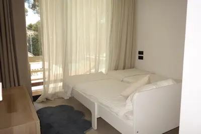 Cama o camas de una habitación en La Casa Blanca de Tamariu