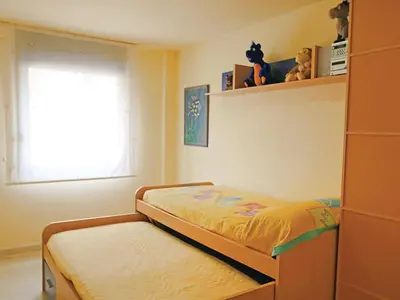 Cama o camas de una habitación en Apartamento de vacaciones con terraza