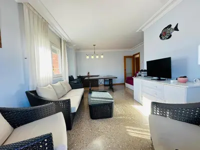 Una televisión o centro de entretenimiento en Brunasmar – Piscina, Parking y Centro Tossa