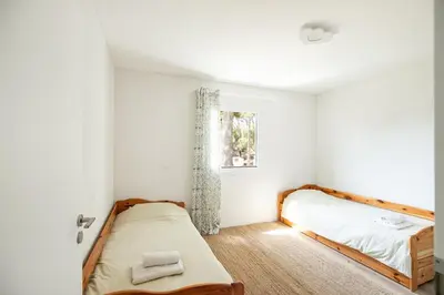 Cama o camas de una habitación en Tamariu - Beautiful Villa with Pool