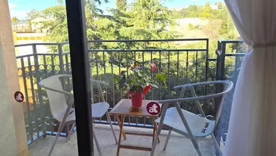 Un balcón o terraza de NEXTHOME City Center & Pool