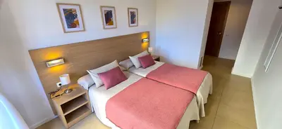 Cama o camas de una habitación en NEXTHOME City Center & Pool
