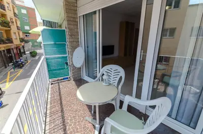 Un balcón o terraza de Apto Lyra cerca de playa 5 huéspedes