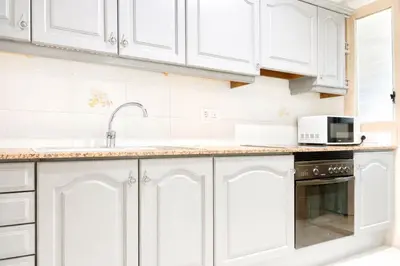 Una cocina o zona de cocina en Penthouse - Balcony - Private Beach - Private Pool