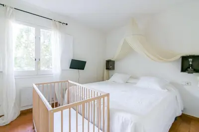 Cama o camas de una habitación en Villa Canadell con Parking Piscina y Barbacoa
