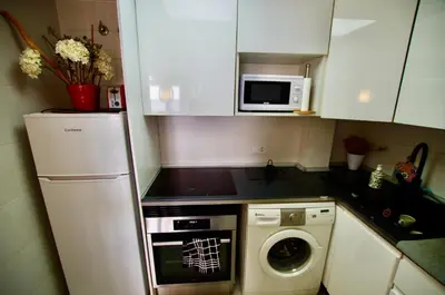 Una cocina o zona de cocina en V&V LLORET- Apartment Carabella centro Lloret con vistas mar