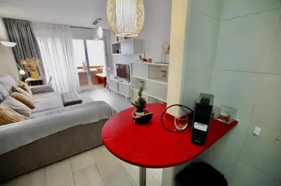 Zona de estar de V&V LLORET- Apartment Carabella centro Lloret con vistas mar