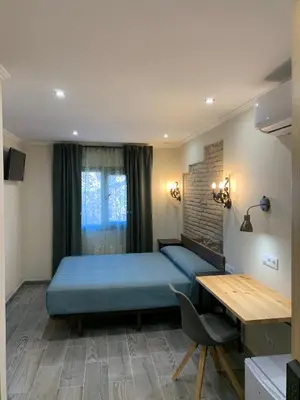 Cama o camas de una habitación en Hostal Milana Girona