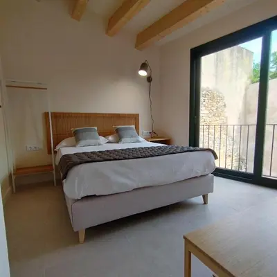 Cama o camas de una habitación en Empordà Apartament-Peratallada