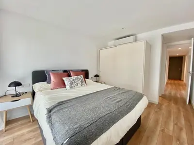 Cama o camas de una habitación en LLOGUER30 Llevantí, near the sea