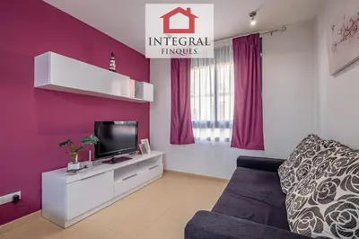 Una televisión o centro de entretenimiento en Sakura Apartment Palamós
