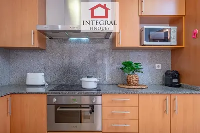Una cocina o zona de cocina en Apartament Cel Blau