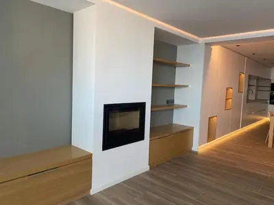 Una televisión o centro de entretenimiento en Апартаменты