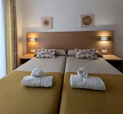 Cama o camas de una habitación en Rincón Costa Verde - Premium Apartment & Pool