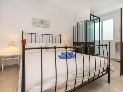 Cama o camas de una habitación en Apartment Serenity by Interhome