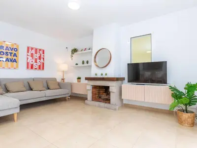 Una televisión o centro de entretenimiento en Holiday Home El Moli-1 by Interhome