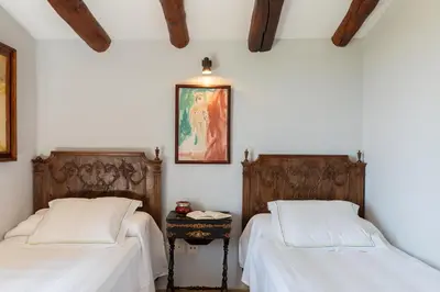 Cama o camas de una habitación en Exquisite farmhouse in the Empordà Costa Brava