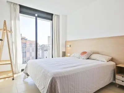 Cama o camas de una habitación en Winahost Lloret Brisa