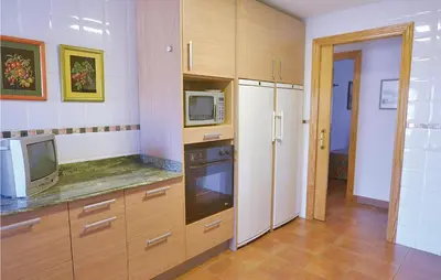 Una cocina o zona de cocina en 7 Bedroom Lovely Home In Santa Susanna