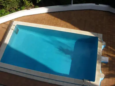 Piscina en o cerca de APARTAMENTO CERCA DE LA PLAYA CON PISCINA y PARKING