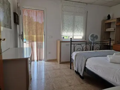 Cama o camas de una habitación en Family Vacation Casita