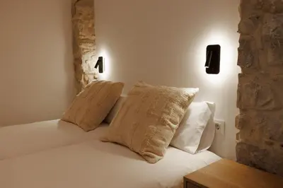 Cama o camas de una habitación en Bravissimo Pont Sant Agusti, Monthly Apartments