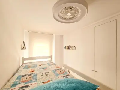 Cama o camas de una habitación en Acogedor apartamento en Palamós, cerca de la playa