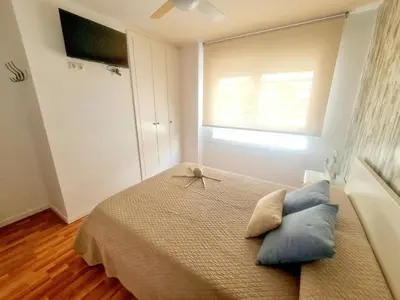 Cama o camas de una habitación en Acogedor apartamento en Palamós, cerca de la playa