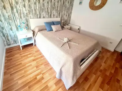 Cama o camas de una habitación en Acogedor apartamento en Palamós, cerca de la playa