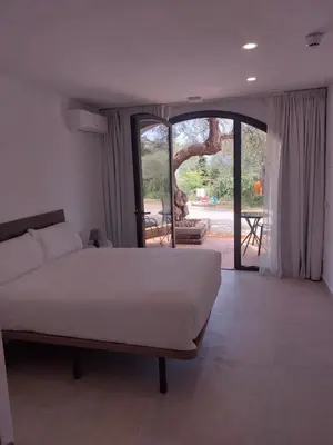 Cama o camas de una habitación en Hotel Nuevo Ondina