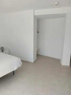 Cama o camas de una habitación en Hotel Nuevo Ondina