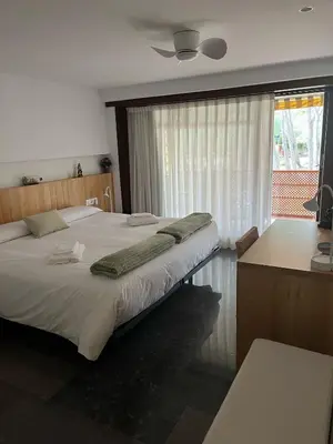 Cama o camas de una habitación en Eden Mar Sant Antoni de Calonge
