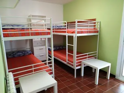Litera o literas de una habitación en Allotjament Bogues